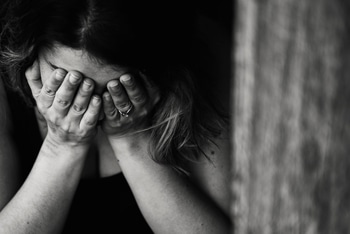 Woman-Crying Woman Crying Into Hands